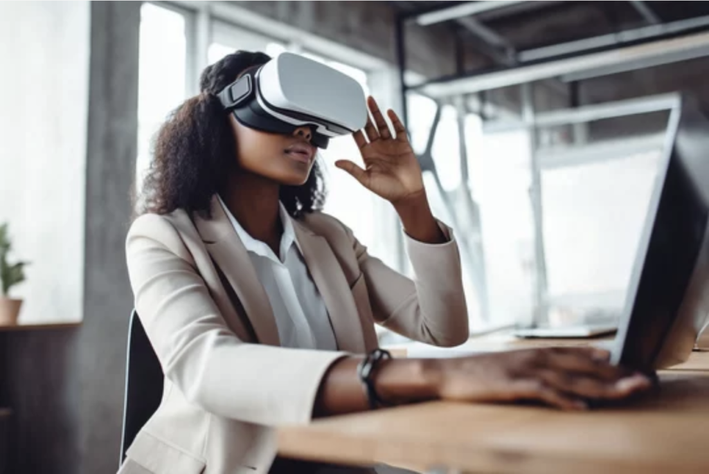 African American businesswoman using VR goggles while working in office